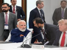Narendra Modi and U.S. President Donald Trump conversing at the G7 summit